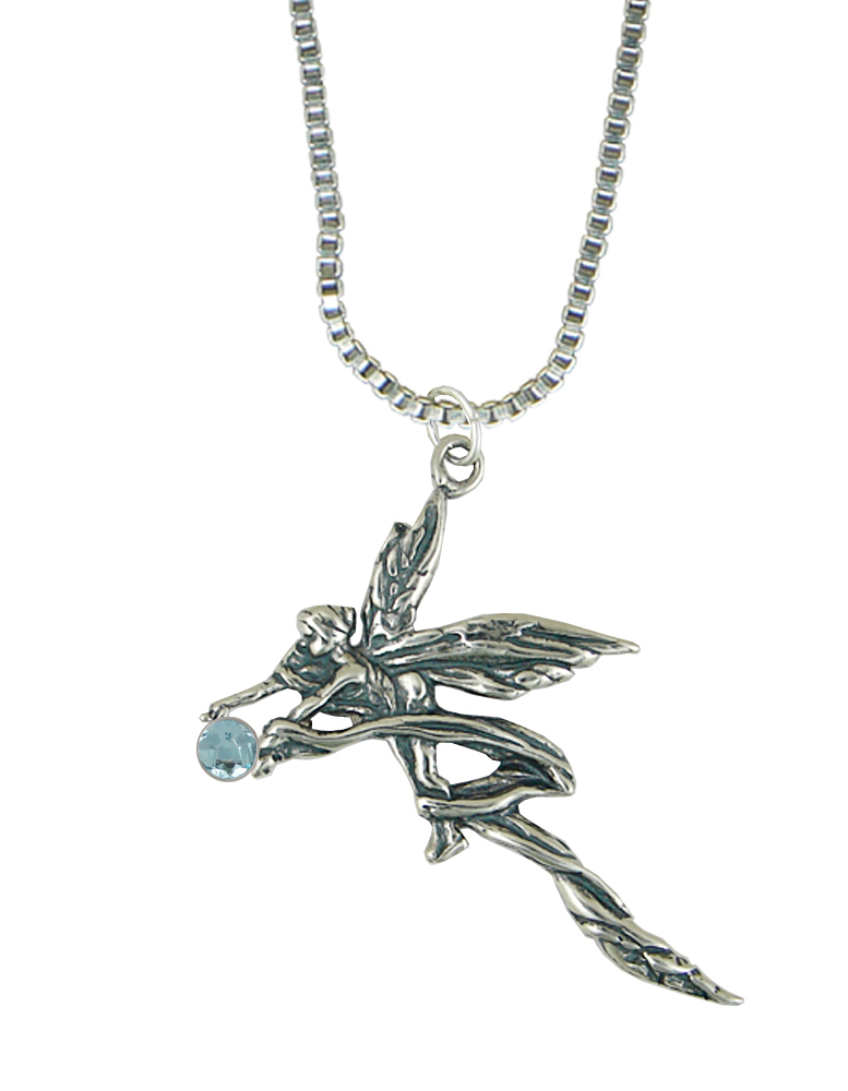 Sterling Silver Ribboned Fairy Pendant With Faceted Blue Topaz